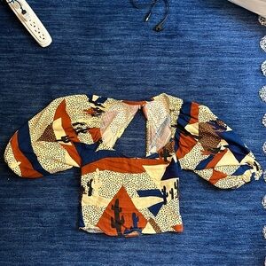 The Odells Size small top with large puff sleeves